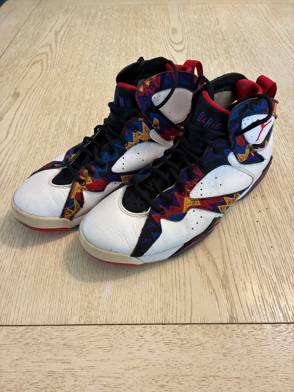 Men’s Nike Jordan Jordan 7 Retro
Nothing But Net Sneaker Shoes (Multicolor)